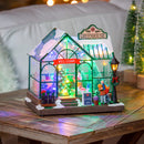 8" LED Christmas Greenhouse with Rotating Tree & Music Table Decor
