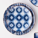Close-up of indigo blue and white shibori-inspired pattern on porcelain tray